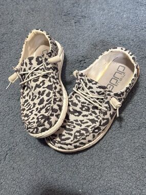 Hey Dude Women’s Slip-On Sneakers in Cream and Black Leopard Print